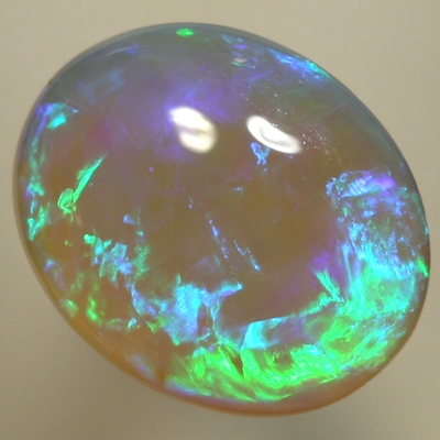 SOLID CRYSTAL OPAL Bright green and turquoise over a purple hue